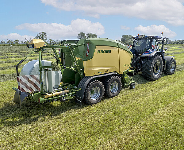 The baler manages the tractor