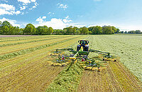 Krone UK rotary rake in field